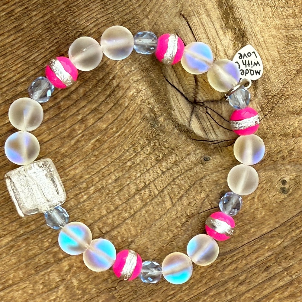 Elegant Beaded Bracelet with Pink and Silver Accents of sea glass.